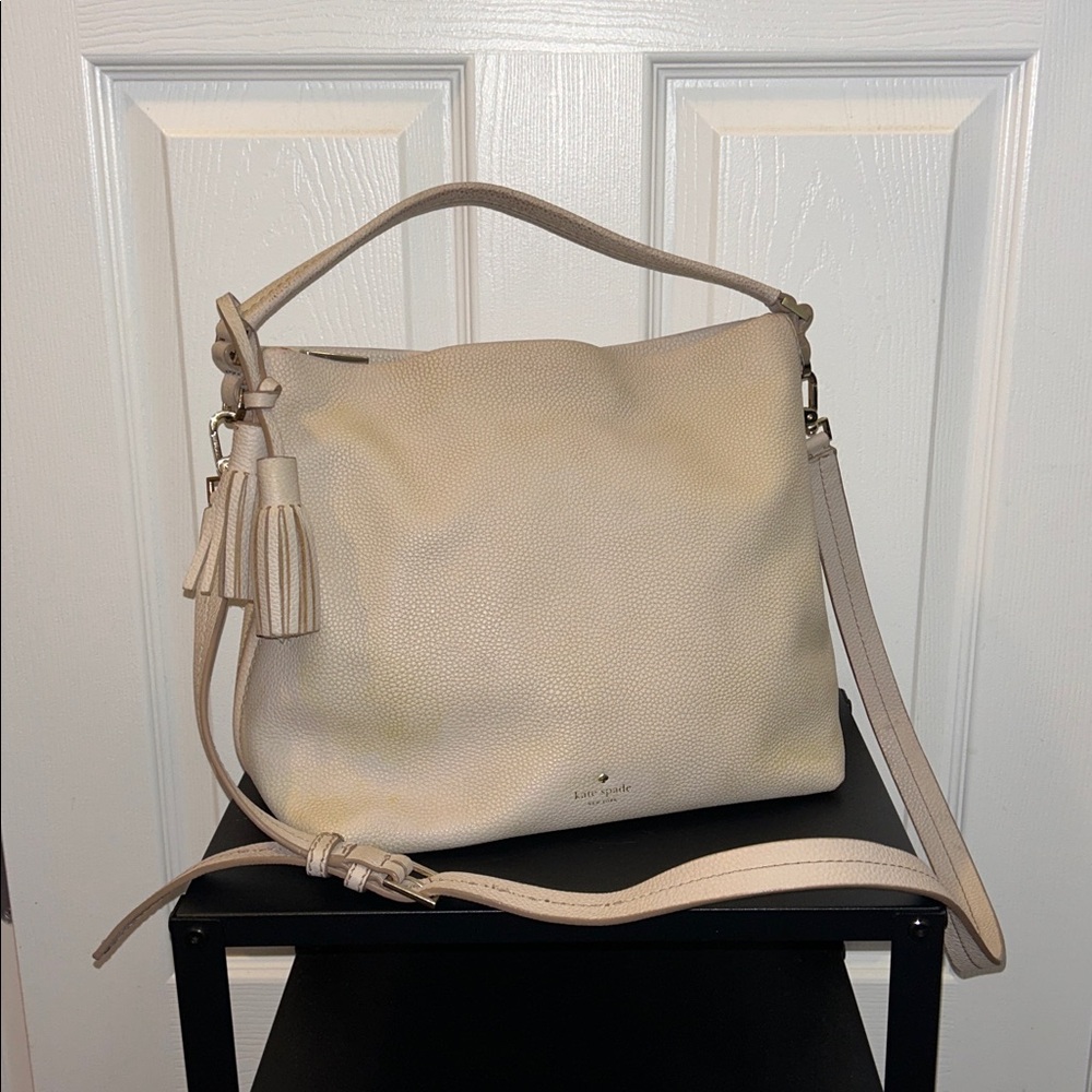 Kate Spade Beige Pebbled Leather Shoulder Bag with crossbody strap.